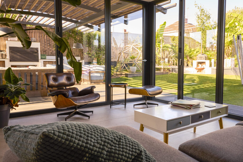Glass Walled Room Looking Out Onto Outdoor Seating 2024 10 19 15 56 18 Utc